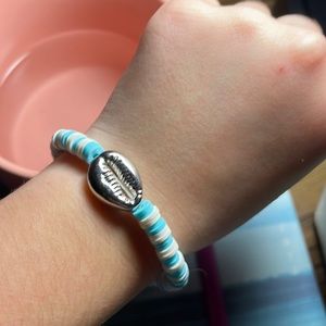 Cute, baby, blue and white bracelet with silver shell